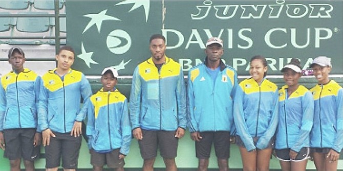 JOB WELL DONE: Coaches Ceron Rolle (fourth from left) and Bradley Bain (fourth from right) with Junior Fed and Davis Cup team members.