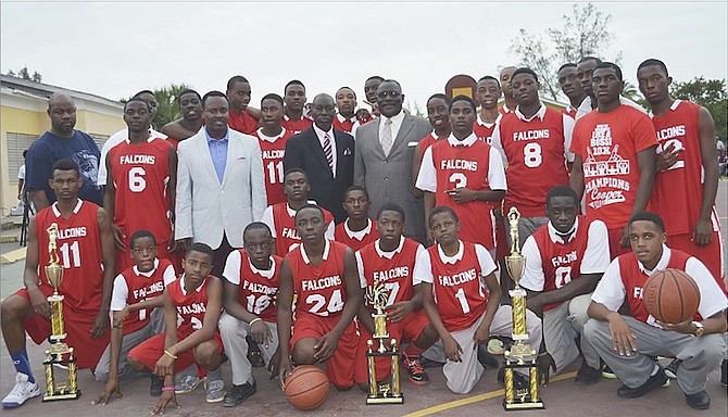 CHAMPIONS: The Jordan Prince William Falcons junior and senior boys basketball teams were crowned as the Bahamas Association of Independent Secondary Schools champions for the second time in history.