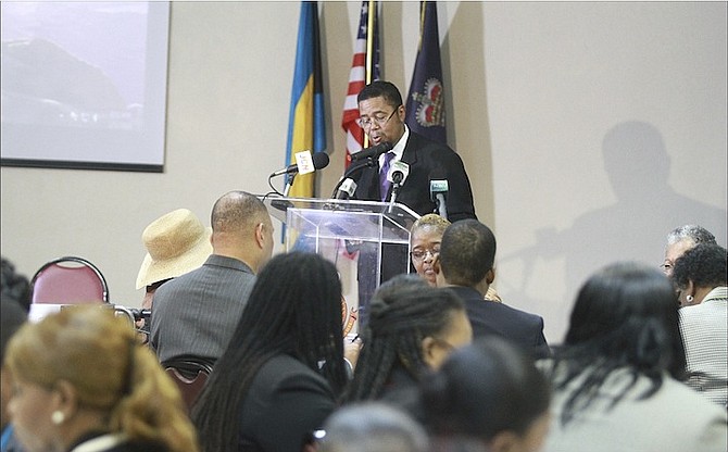 Minister of Health Dr Perry Gomez speaks at a conference on health-related sustainable development goals at the police headquarters. Photo: Tim Clarke/Tribune Staff