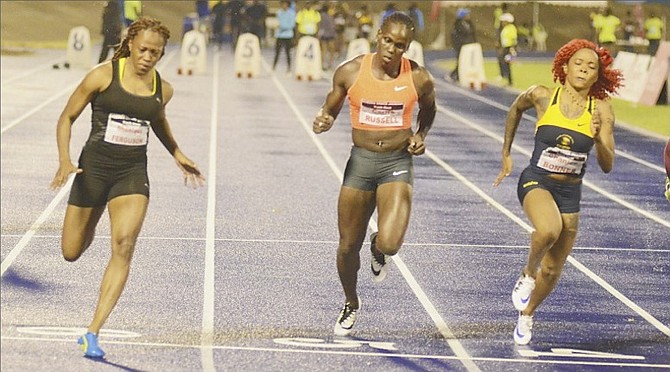 SHENIQUA FERGUSON competes in the 60-metre dash at the Queen’s/Grace Jackson Track Meet at the National Stadium in Kingston, Jamaica, on Saturday.
