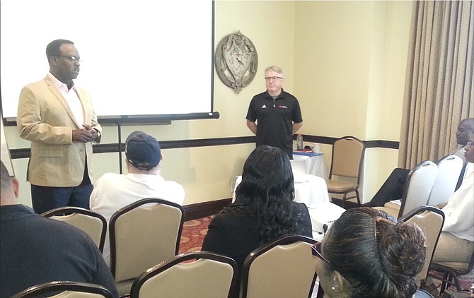 Minister of Youth, Sports and Culture Dr Daniel Johnson addresses the CANOC Seminar.