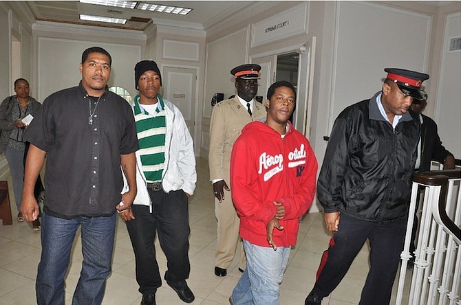 THE men walking free from court after being cleared. 