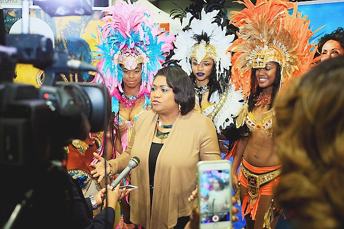 Paulette Zonicle, Bahamas consul general to Washington, DC, with models at the Travel Adventure Show in the city to mark the launch of promotion efforts for this year’s Junkanoo Carnival.
Photo: Felipé Major