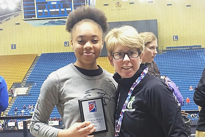 BRIA SANDS (left) with head coach Cathy Faust.