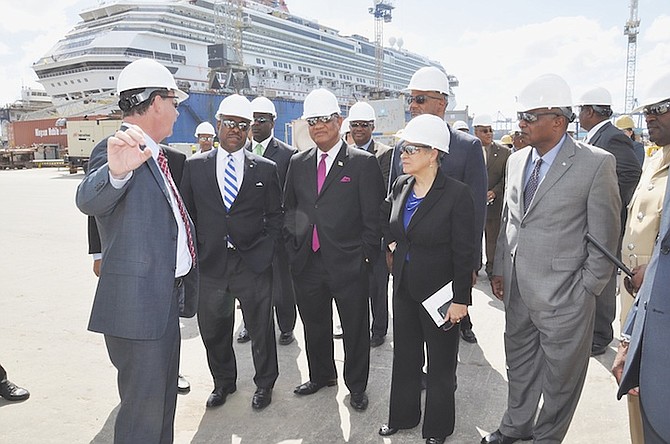 Prime Minister Perry Christie, centre, along with, from left, Minister of Tourism Obie Wilchcombe; Minister of Education, Science and Technology Jerome Fitzgerald; Minister of Transport and Aviation Glenys Hanna-Martin; and Minister for Grand Bahama Dr Michael Darville on Thursday toured the Grand Bahama Shipyard. Photo: Vandyke Hepburn/BIS