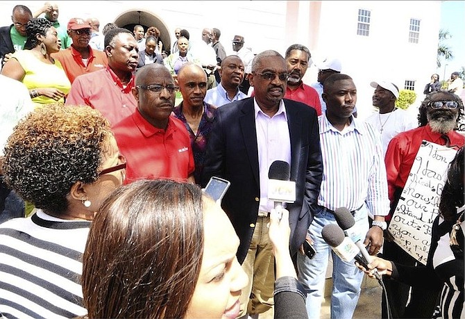 Dr Hubert Minnis outside court in 2014 at the arraignment of the Cabbage Beach protestors.