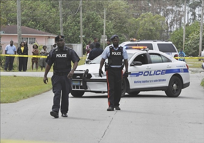 Police at the scene in Freeport. Photo: Vandyke Hepburn