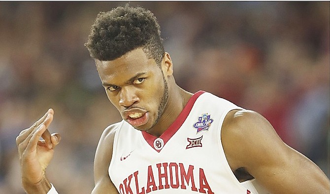 Oklahoma’s Buddy Hield, of the Bahamas, reacts to a three-point basket during the first half of the NCAA Final Four tournament college basketball semi-final against Villanova Saturday night in Houston. (AP)