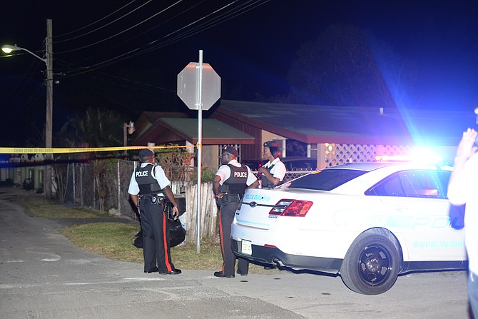 Police at the scene of the shooting in Ridgeland Park on Wednesday night. 

Photo: Shawn Hanna/Tribune Staff
