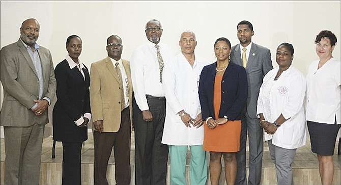 From left, Michael Cooper, Harriet Lundy-Gardiner, Dr Locksley Munroe, Dr Charles Clarke, Dr Sy Coolidge Pierre, Dr Carnille Farquharson, Emmanuel Komolafe, Kitiboni Adderley and Dr Christina Messara. 
Photos: Shawn Hanna/Tribune Staff