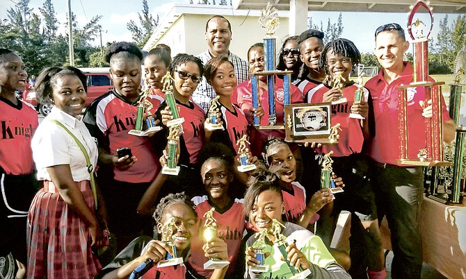 CHAMPIONS: The CR Walker Knights senior girls show off their trophies after winning the Government Schools Secondary Sports Association soccer championships. The senior boys were also victorious.