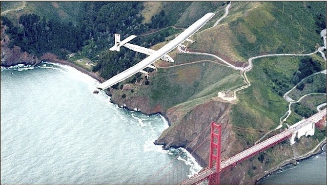 The Solar Impulse 2 flies over the Golden Gate Bridge in San Francisco. (AP)