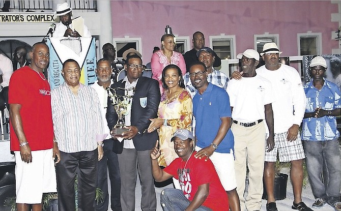 CLASS A CHAMPIONS: Prime Minister Perry Christie (second from left) shares a special moment during the presentation to the crew from Lady Muriel, Class A champions in this year’s regatta.