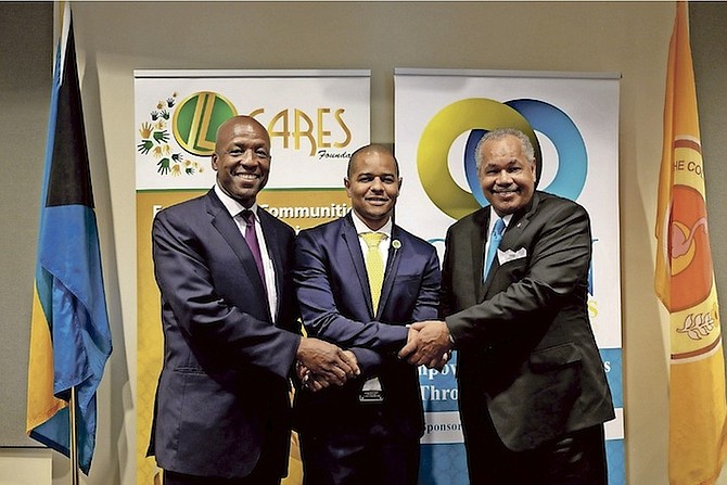 From left, Alfred Sears, College of The Bahamas council chairman; Sebas Bastian, CEO of Island Luck, and Rodney Smith, president and chief executive officer of the College of the Bahamas, at yesterday’s announcement. 
Photo: Shawn Hanna/Tribune staff