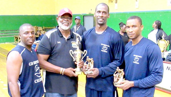 Quentin Hall (left) and Franco Miller (right) share a moment with MVP Scott Forbes as they are presented with their awards from BBF president Charlie ‘Softly’ Robins.