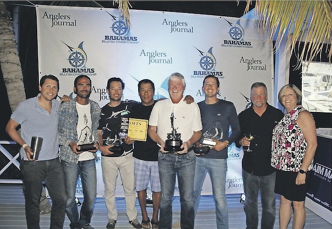 The winning team from Bamboo celebrate victory in the Bahamas Billfish Championship at Guana Cay.
