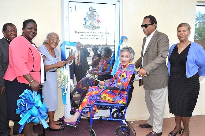 Minister of Social Services Melanie Griffin (second left) at the official opening of the new unit.