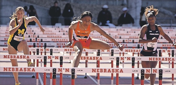 WINNING WAYS: High hurdler Pedrya Seymour (centre) on the way to her second-place finish in the 100 metre hurdles at the Big Ten Conference Championships on Sunday.  