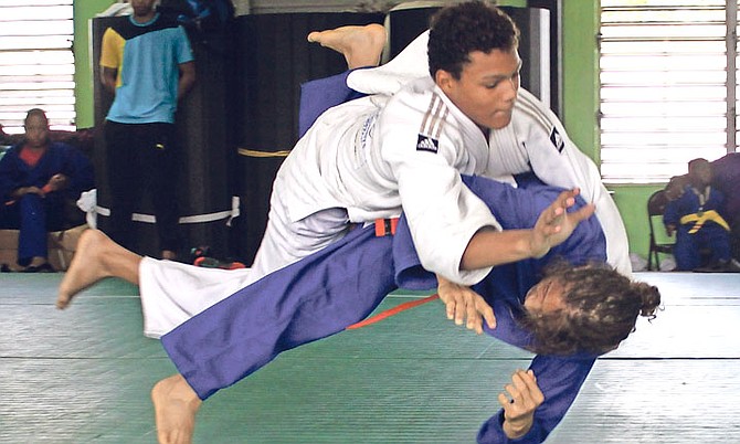 ON THE MAT: Judo athletes in action in the Bahamas Judo Open tournament over the weekend. 
Photos by Brenda Lee Rae