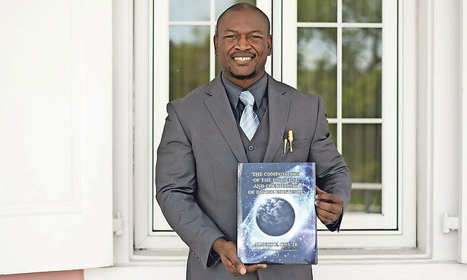 Albert Cox and his book, The Composition of the Universe and Credibility of Divine Existence.
Photo: Shawn Hanna/Tribune Staff