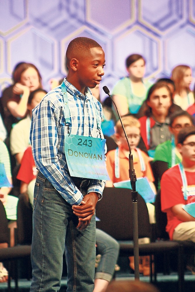Bahamas National Spelling Bee champion Donovan Butler on stage yesterday in the third round of the 2016 Scripps National Spelling Bee in Maryland.

