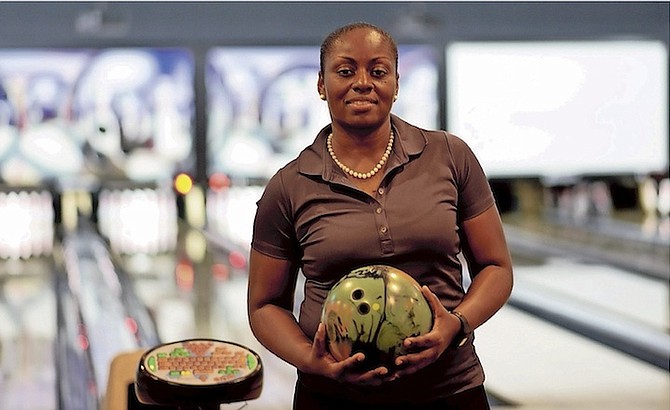 The kingpin: Driskell Rolle holds the top spot on the women’s leaderboard in the Bahamas Bowling Federation’s National Bowling Championships being played at Mario’s Bowling Lanes.     
Photo by Shawn Hanna/Tribune Staff