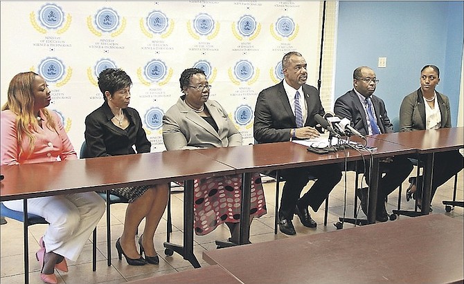 Minister of Education Jerome Fitzgerald at the press conference in April to announce the launch of town hall meetings to discuss the Freedom of Information Act. He is pictured with, from left, Shantel Taylor, Fern Bowleg, Janice Knowles, Shane Miller and Shari Moxey. Photo: Tim Clarke/Tribune Staff