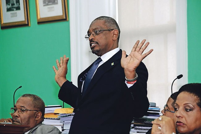 Dr Hubert Minnis speaks in the House of Assembly.