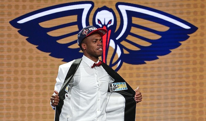 Buddy Hield reacts after being selected sixth overall by the New Orleans Pelicans during the NBA basketball draft, Thursday, in New York. (AP Photo/Frank Franklin II)
