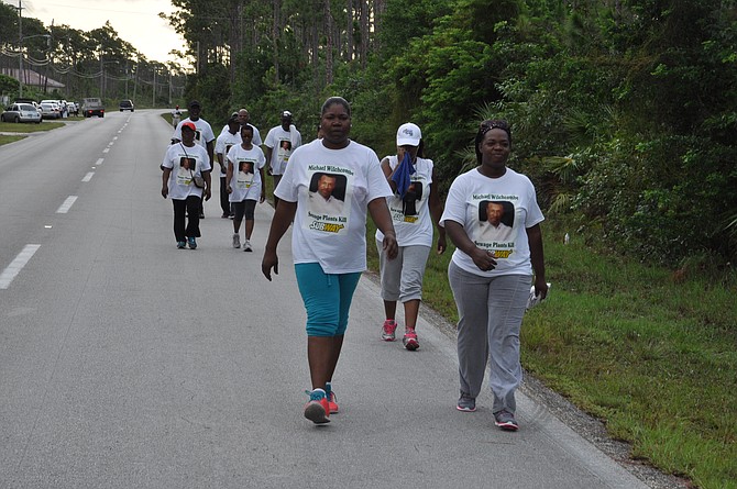 Residents during the walkathon to raise awareness of concerns over sewerage fumes. 