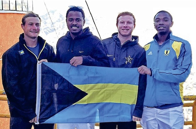 WINNING WAYS: Bahamas’ Davis Cup team of brothers Baker and Spencer Newman, Marvin Rolle (second from right) and Kevin ‘KJ’ Major (far right) proudly hold the Bahamas flag in Bolivia.