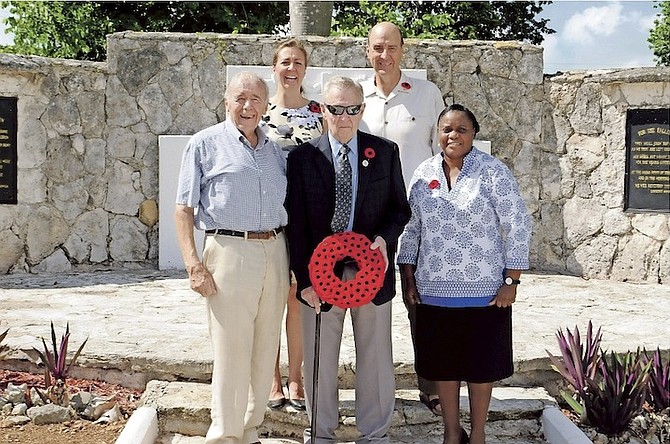 Major Jack Ryall at the Nassau War Cemetery on Sunday with his son Mike, daughter Lisa, former British High Commissioner to the Bahamas, Peter Young, and Marine Adina Munroe. Photos: RBDF
