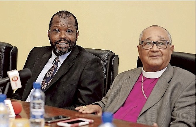 Wayne Munroe and Archbishop Drexel Gomez.