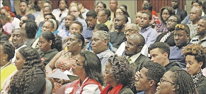 Attendees at a town hall meeting to discuss the proposed NHI scheme. The Bill before Parliament has been endorsed by KPMG, which helped to organise events to engage the public.  