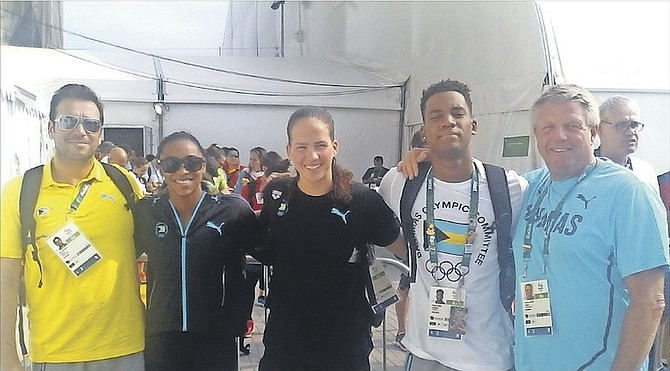 Bahamas swim team (l-r) of coach Lionel Moreau, Arianna Vanderpool-Wallace, Joanna Evans, Dustin Tynes and head coach Andy Loveitt at the 2016 Olympic Games in Rio de Janeiro, Brazil.