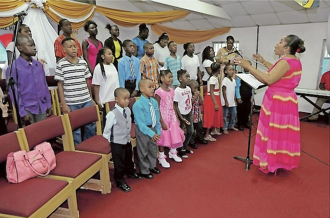 Youngsters singing at the Fox Hill Day service at St Paul’s Baptist Church yesterday.