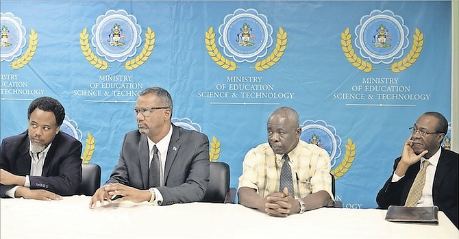 From left, Marcellus Taylor, deputy director in the Ministry of Education, Science and Technology; Jerome Fitzgerald, Minister of Education, Science and Technology; Lionel Sands, director in the Ministry of Education and Pastor Cedric Moss at yesterday’s press conference. Photo: Shawn Hanna/Tribune Staff