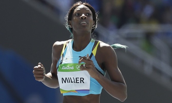 Shaunae Miller winning her heat in the 400m. (AP)