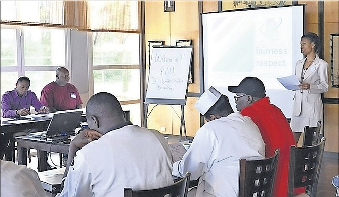 Bahamas Family Planning consultant Lowena West (far right) facilitates a workshop.
