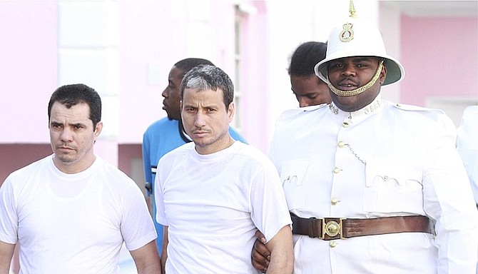 Cuban detainees Carlos Pupo and Lazaro Seara outside court on Thursday. Photo: Tim Clarke/Tribune Staff