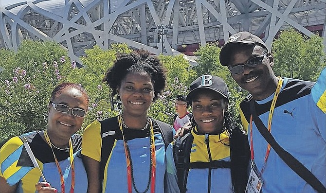 LAUREN CHARLTON-SZCZYGIEL (second from left), with her mother Laura, sister Devynne and father Dave, in Beijing, China at last year’s IAAF World Championships.