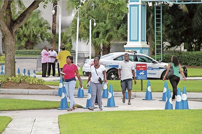 Baha Mar workers going to collect the pay they are owed this week. 