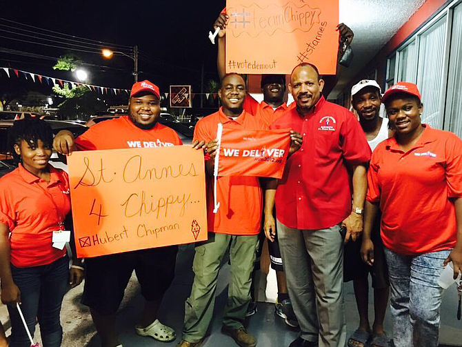 Dr Duane Sands and St Anne's constituents express their support for Hubert Chipman's re-nomination as MP outside the FNM headquarters on Thursday night