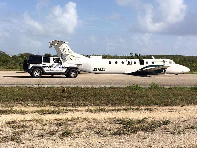 The Southern Air plane on the runway at Deadman's Cay, Long Island, on Friday. 