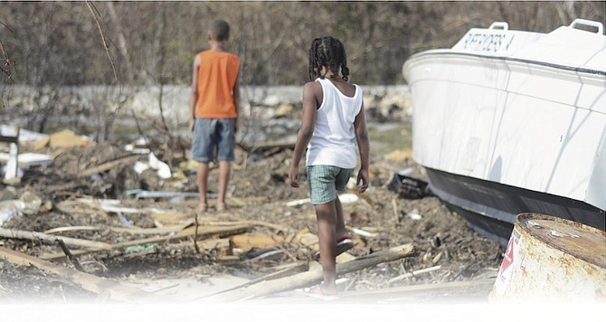 Youngsters on Long Island exploring the wreckage following Hurricane Joaquin last year.
Photo: Shawn Hanna/Tribune Staff