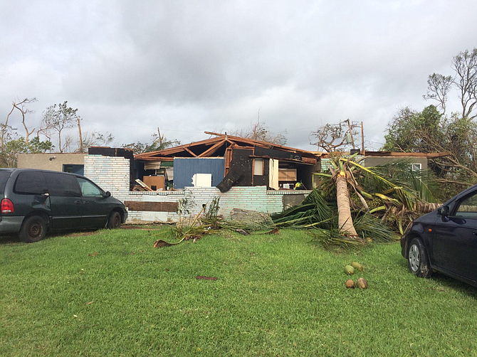 A house in Freeport on Friday morning showing severe damage from Hurricane Matthew
