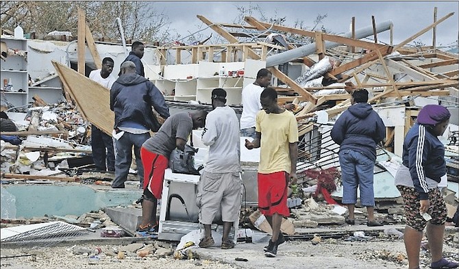 Residents starting to clear up after the storm in Grand Bahama. 
