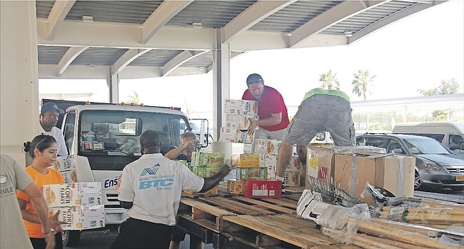RELIEF EFFORT: Supplies from the Cayman Islands include 10 pallets of chainsaws, building materials and baby food items. Photo: Philip Cumming/The Tribune