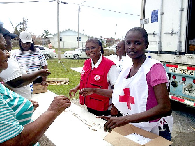 Ice is distributed at the Grand Bahama Red Cross Centre in Freeport.