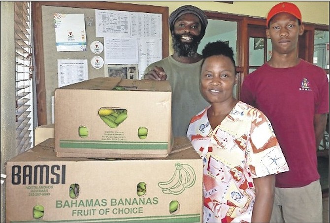 BAMSI donated bananas to the Ranfurly Homes for Children, which currently houses some 26 residents. Pictured from left are Cambridge Cooper, of BAMSI, Judyanne Hepburn, supervisor with the Ranfurly Home, and Devontae Thurston, of BAMSI. 
Photo: BAMSI